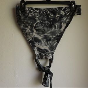 Green and white marbled swimming suit top